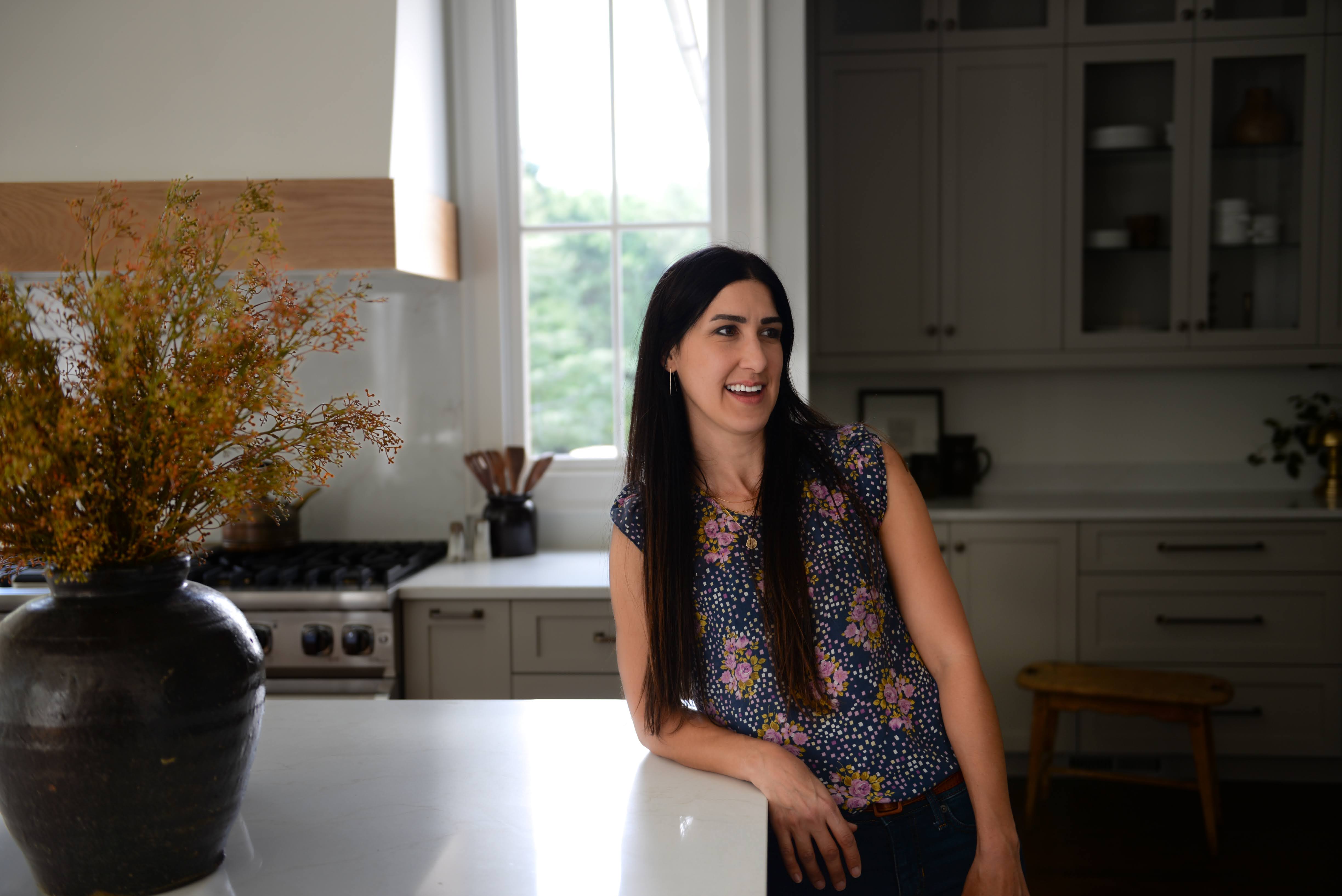 Woman standing in kitchen