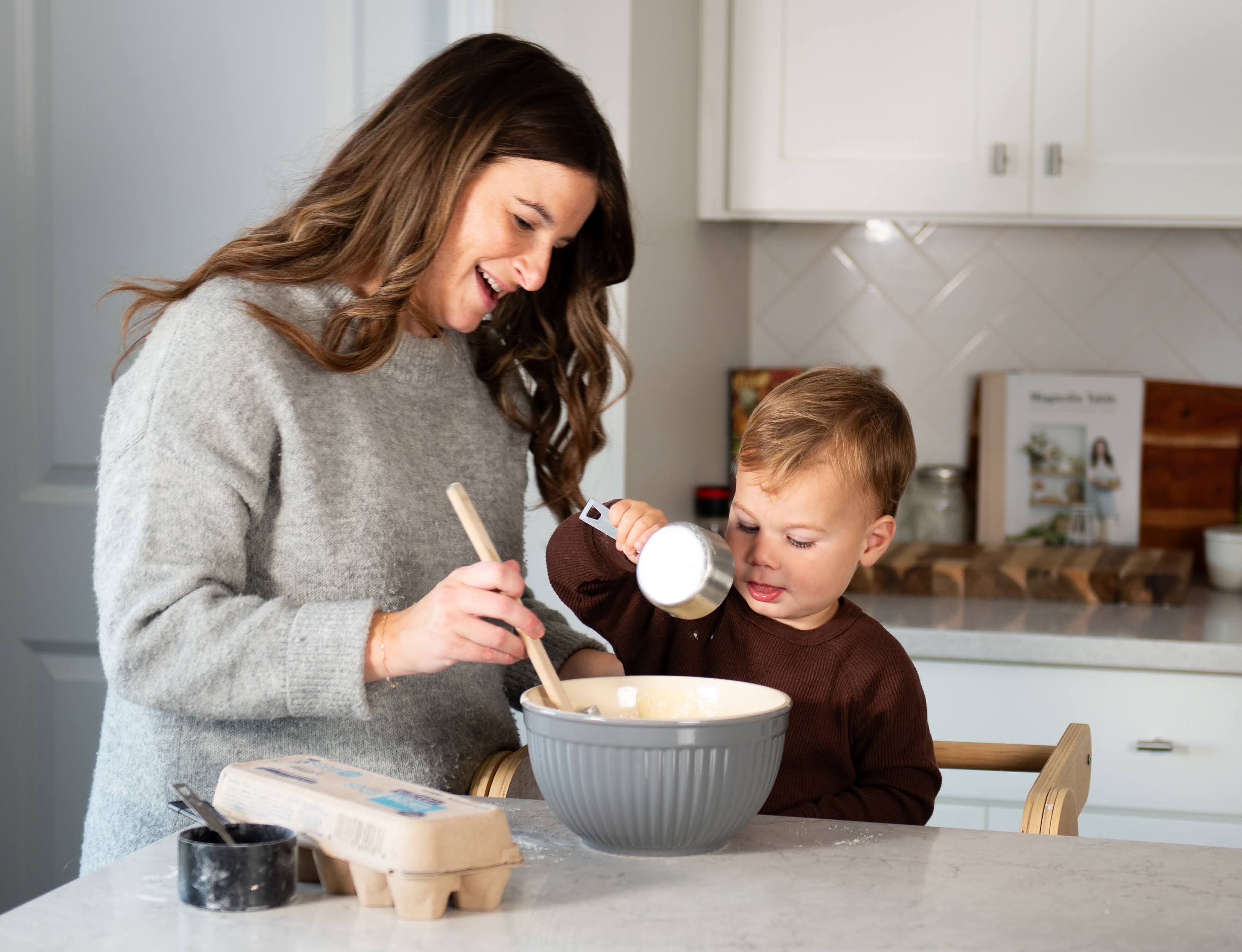 Mom and son baking in the kitchen