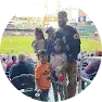 family at a baseball game
